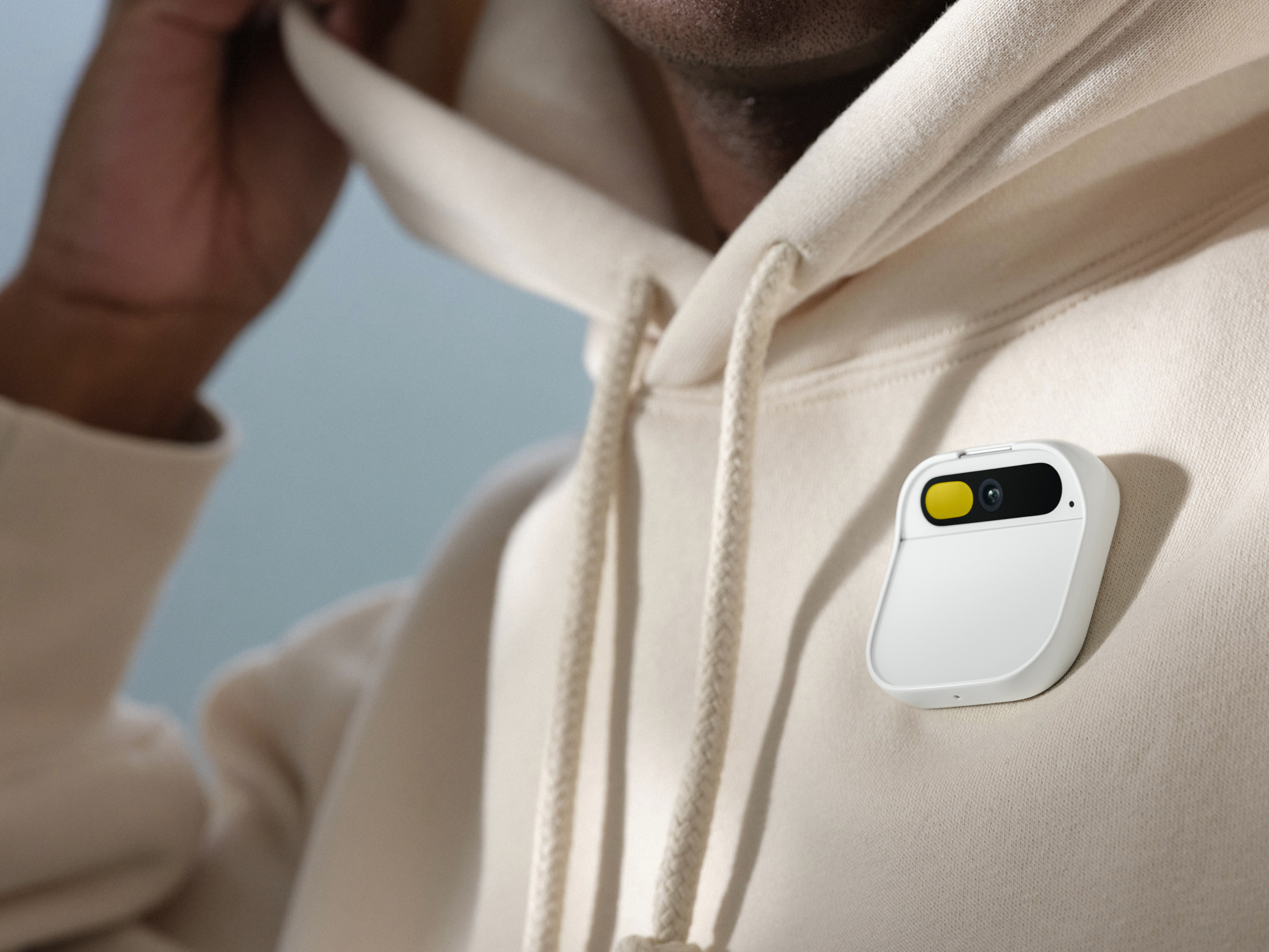 Humane's AI Pin worn on a sweatshirt